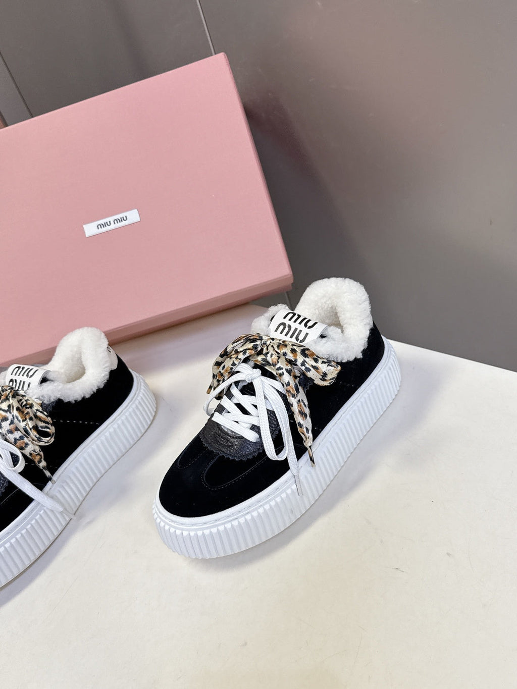 MIUMIU 25S SNEAKERS 45MM IN BLACK SUEDE WITH LEOPARD-PRINT LACES SHEARLING