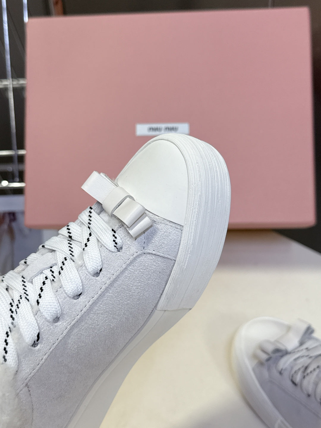 MIUMIU 25S SNEAKERS IN WHITE SUEDE WITH SHEARLING
