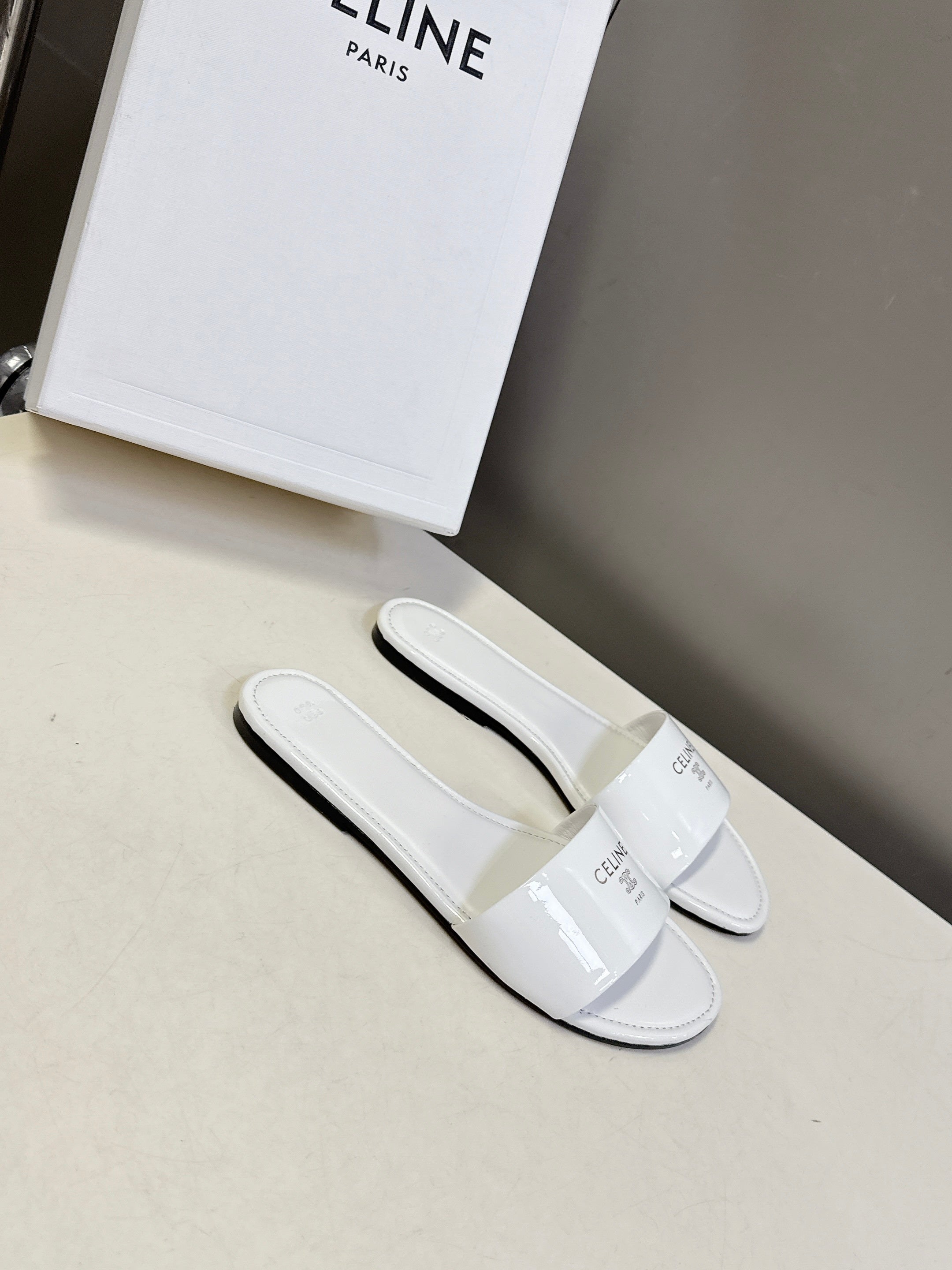 CELINE 26S FLAT SLIDES IN WHITE PATENT LAMBSKIN