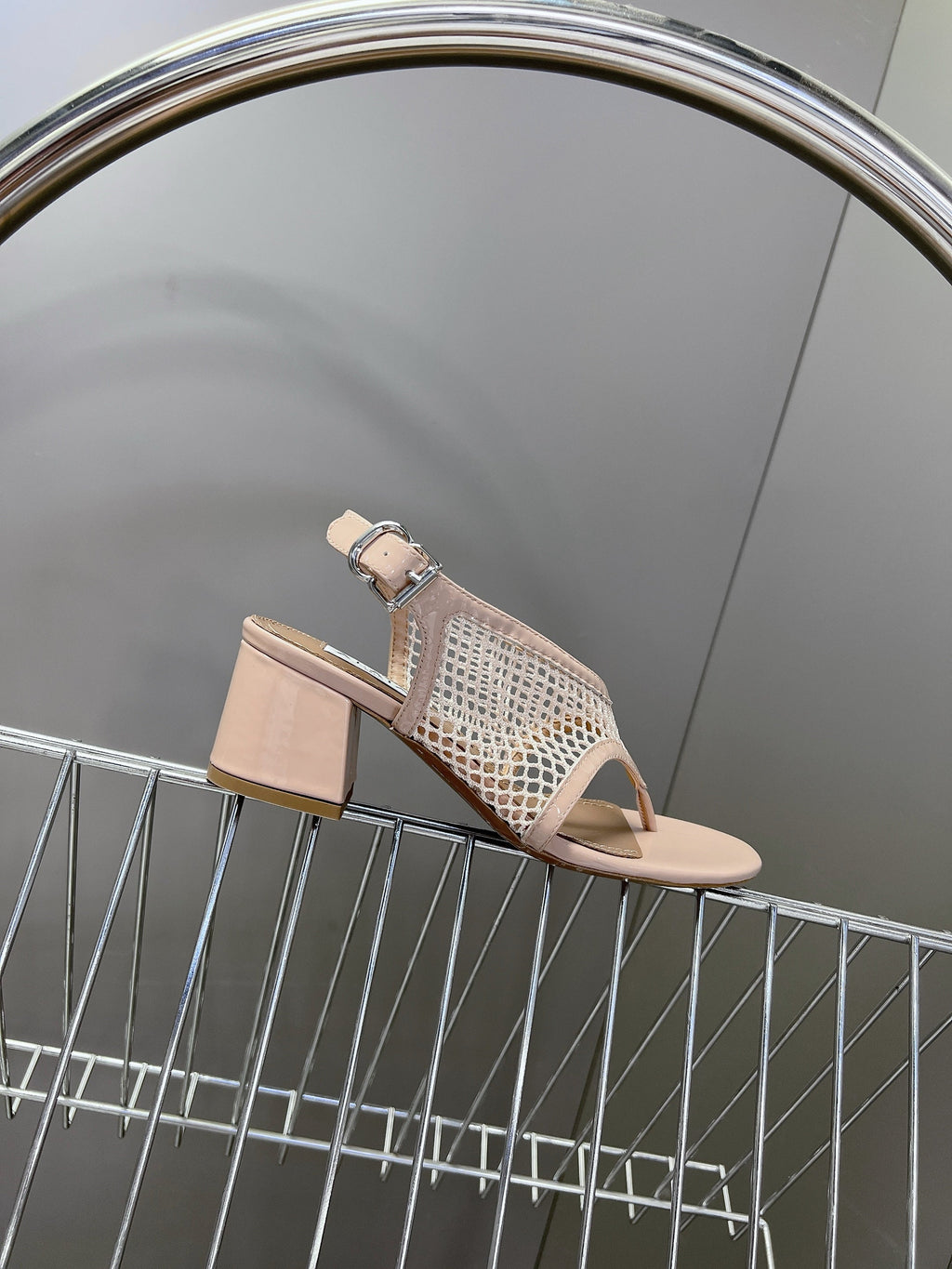 ALAIA 26S MESH THONG HEELS 55 MM IN PALE PINK PATENT CALFSKIN