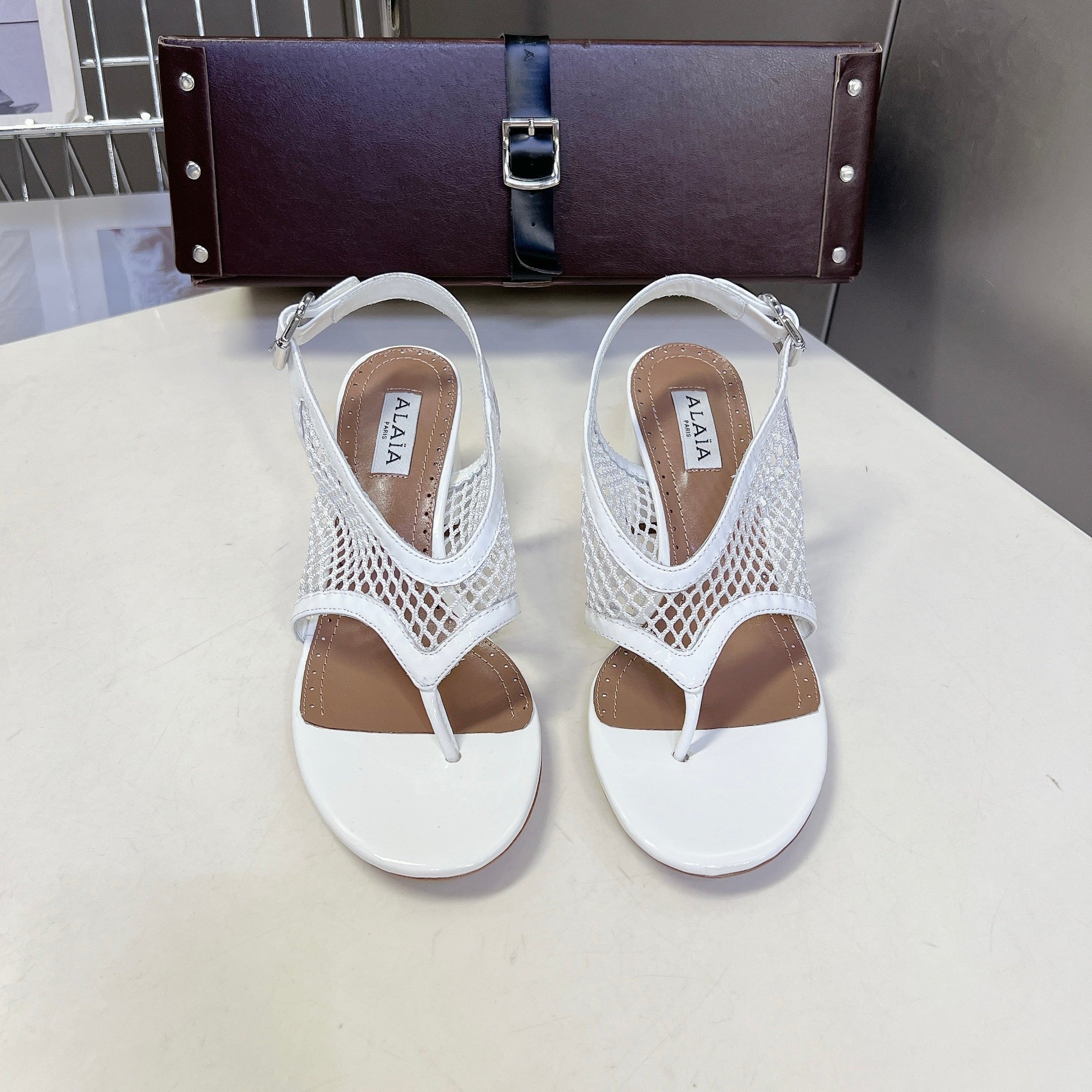 ALAIA 26S MESH THONG HEELS 55 MM IN WHITE PATENT CALFSKIN