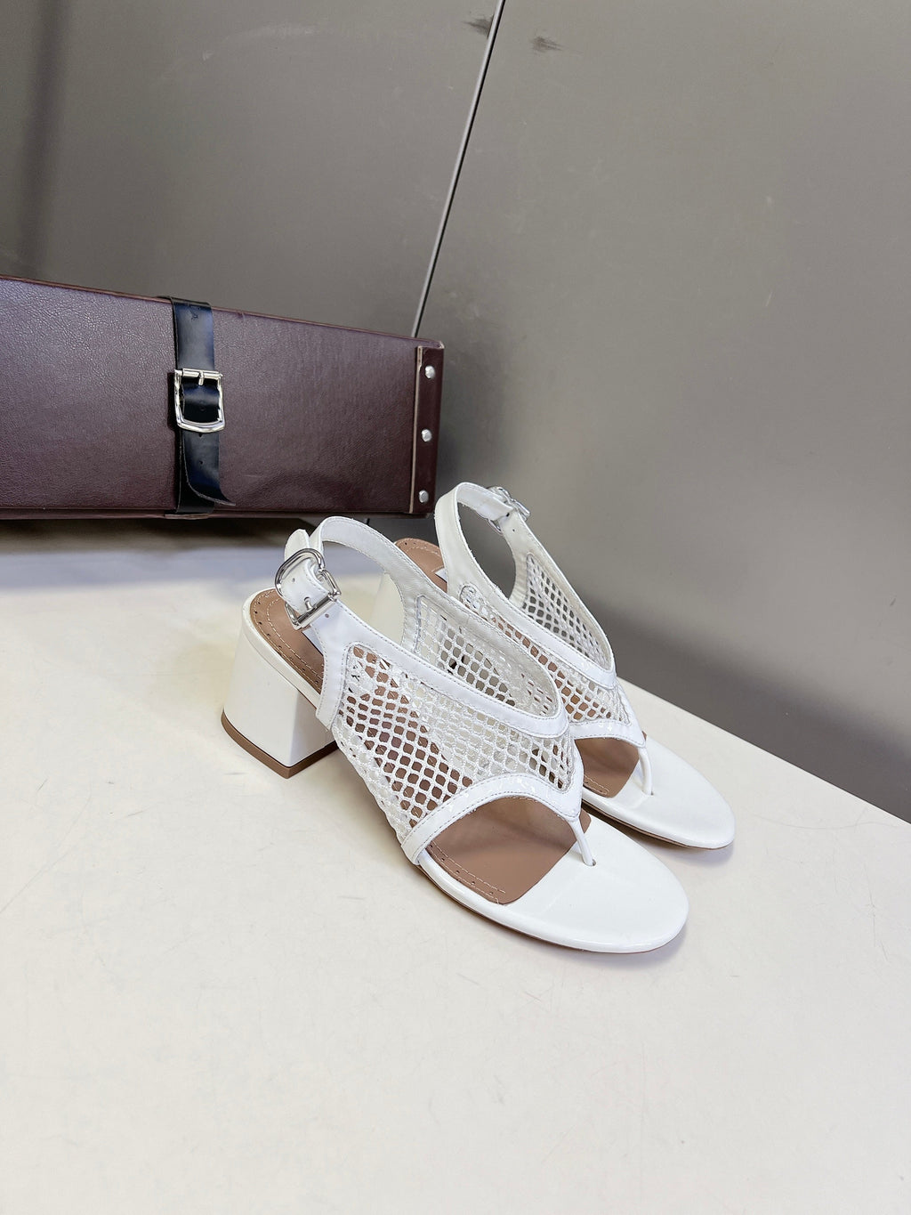 ALAIA 26S MESH THONG HEELS 55 MM IN WHITE PATENT CALFSKIN