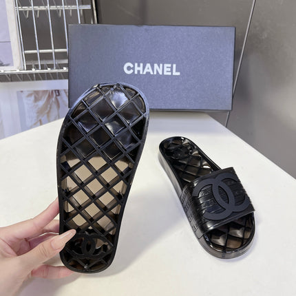 CHANEL 26S SLIDES IN BLACK PVC