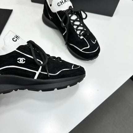 CHANEL 26S SNEAKERS IN BLACK CALFSKIN