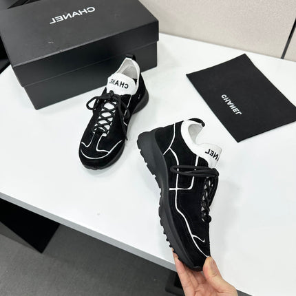 CHANEL 26S SNEAKERS IN BLACK CALFSKIN
