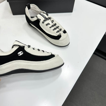 CHANEL SNEAKERS METIERS D-ART 26S IN BLACK AND WHITE SUEDE