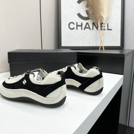 CHANEL SNEAKERS METIERS D-ART 26S IN BLACK AND WHITE SUEDE