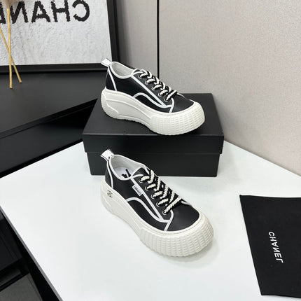 CHANEL 26S CHUNKY SNEAKERS IN BLACK AND WHITE CALFSKIN