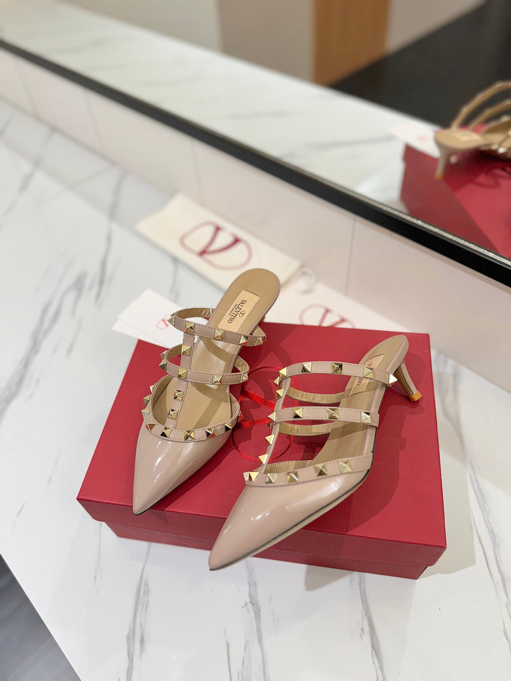 VALENTINO 26S STUDDED HEELED MULES 50 MM IN NUDE PATENT CALFSKIN