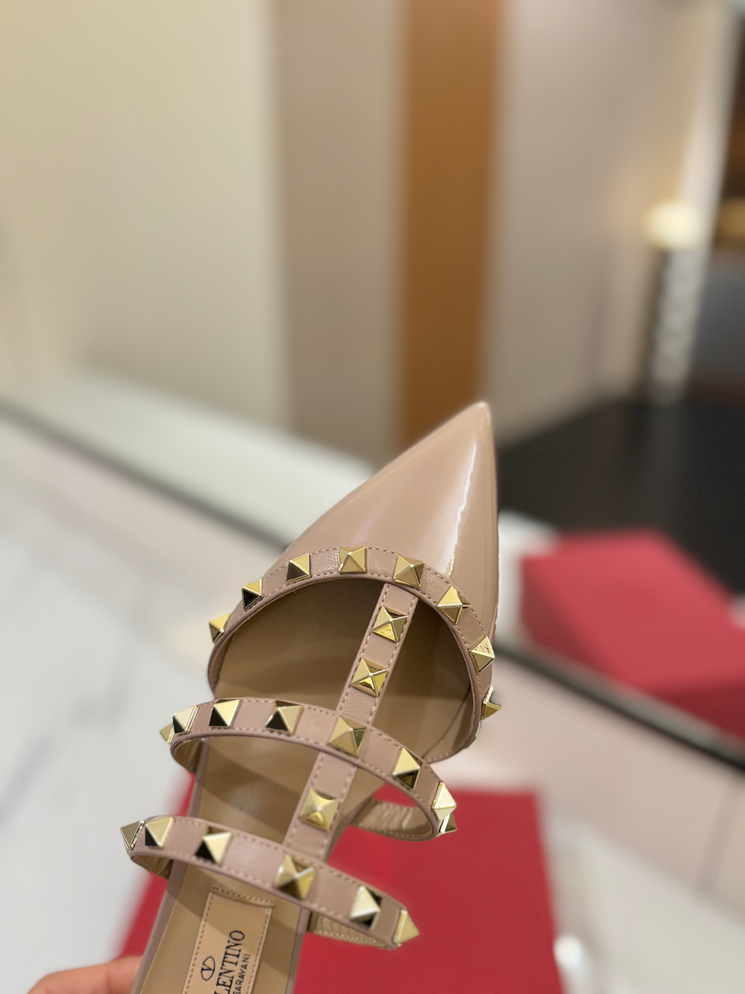 VALENTINO 26S STUDDED FLAT MULES IN NUDE PATENT CALFSKIN