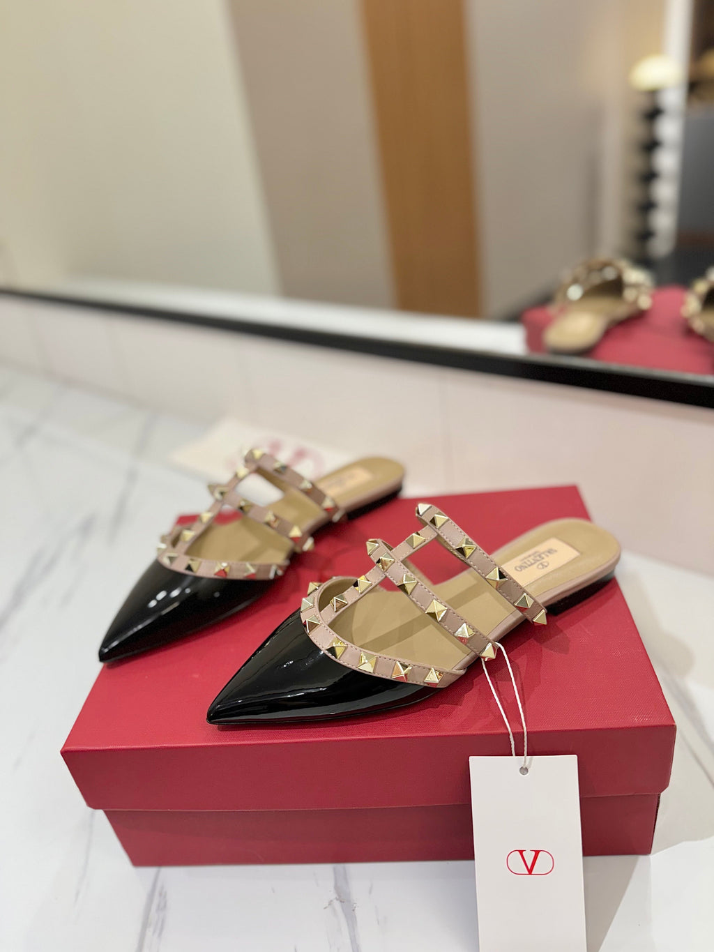 VALENTINO 26S STUDDED FLAT MULES IN BLACK PATENT CALFSKIN