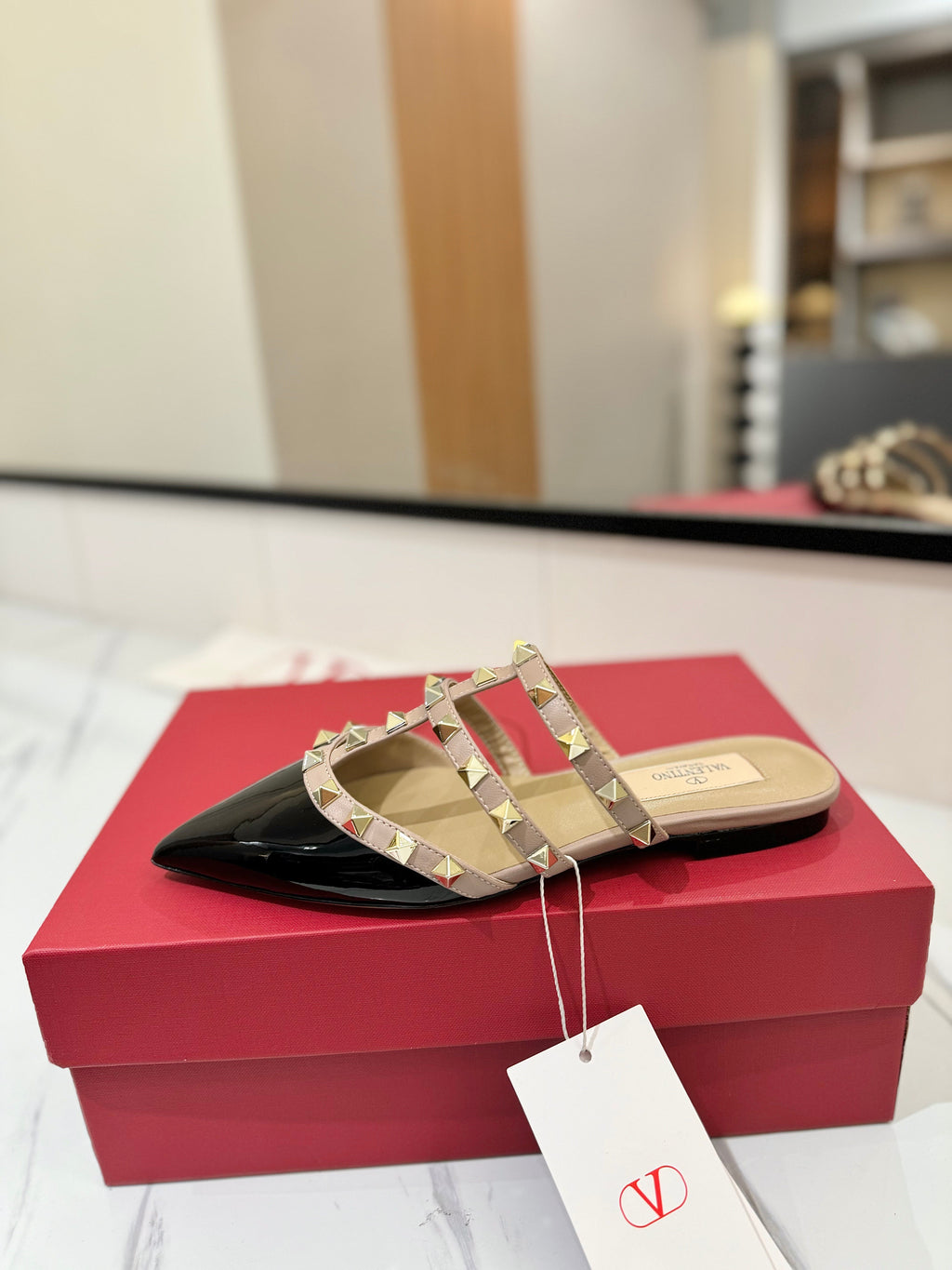 VALENTINO 26S STUDDED FLAT MULES IN BLACK PATENT CALFSKIN