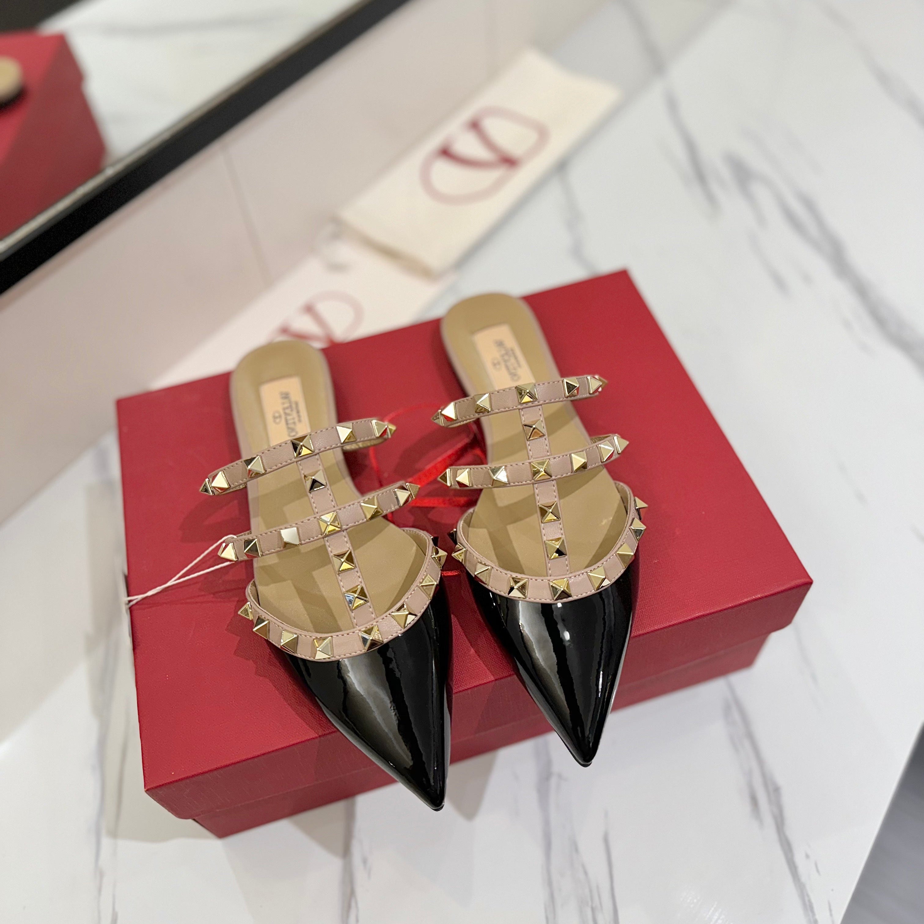 VALENTINO 26S STUDDED FLAT MULES IN BLACK PATENT CALFSKIN