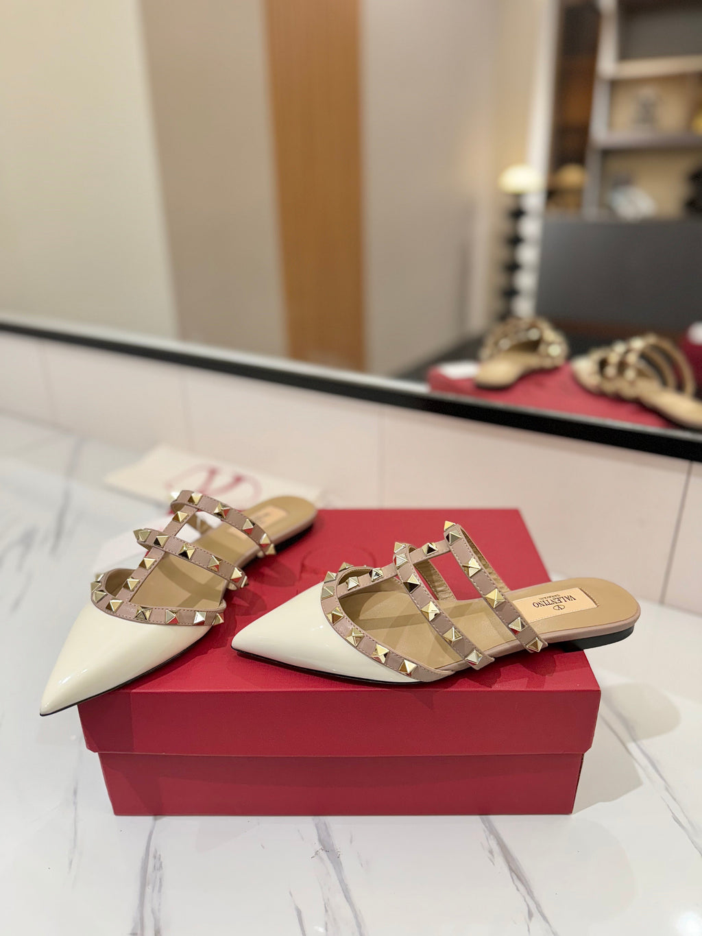 VALENTINO 26S STUDDED FLAT MULES IN WHITE PATENT CALFSKIN