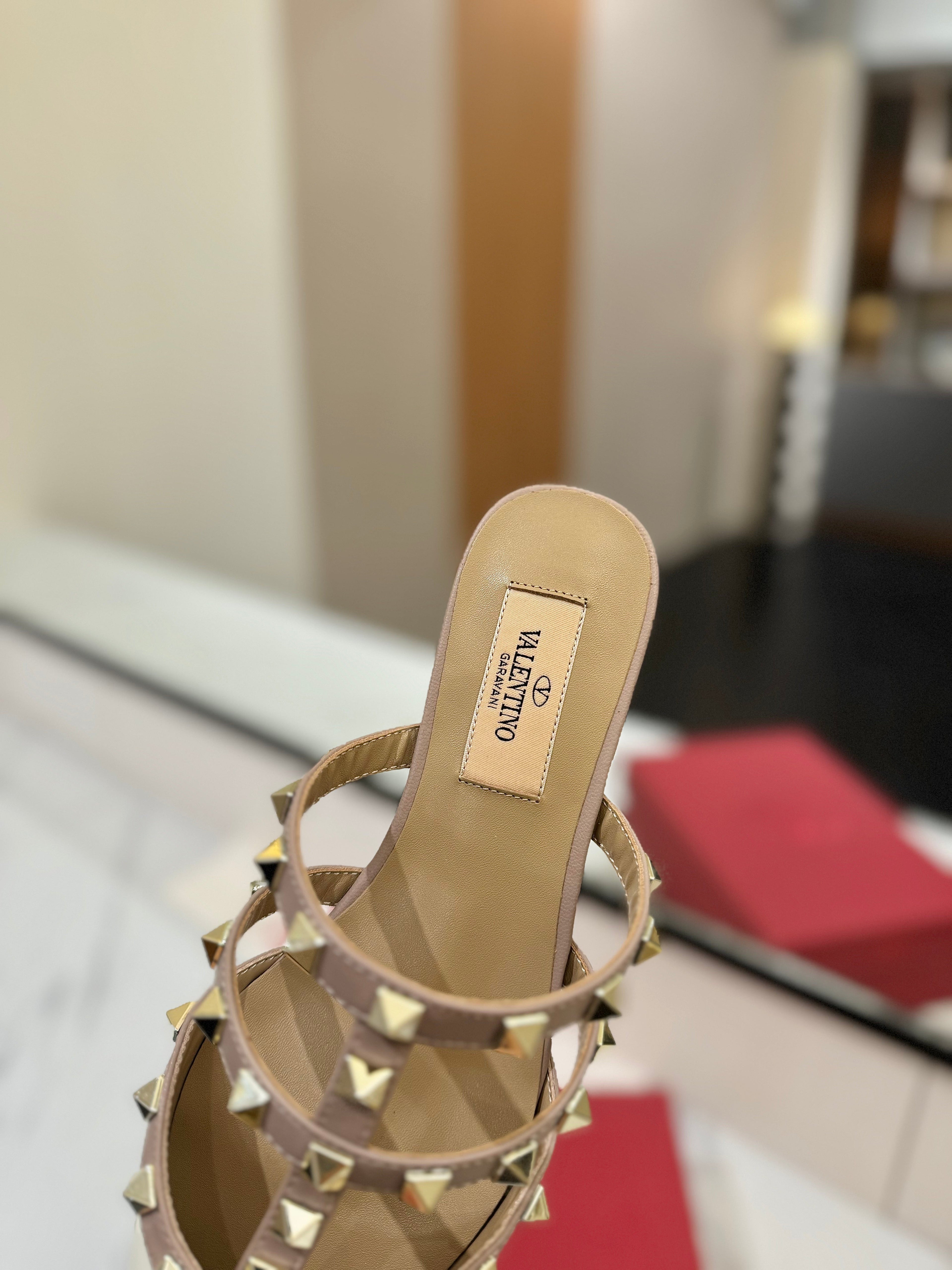 VALENTINO 26S STUDDED FLAT MULES IN WHITE PATENT CALFSKIN