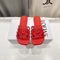 LOEWE 26S PETAL ANAGRAM SLIDE IN DARK RED CALFSKIN
