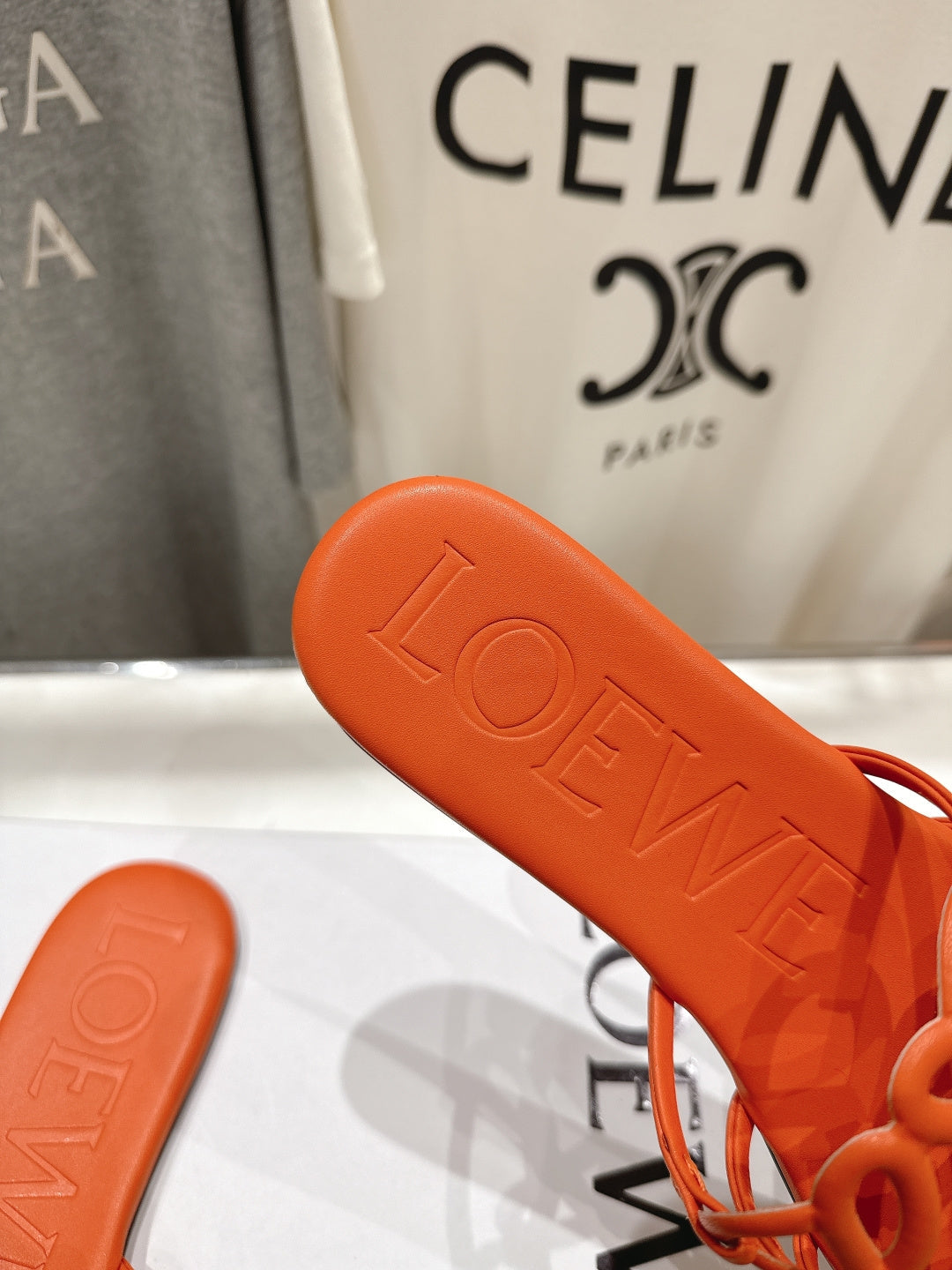 LOEWE 26S PETAL ANAGRAM SLIDE IN BURNT ORANGE CALFSKIN