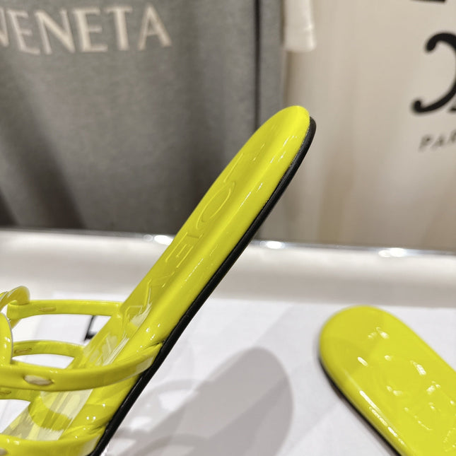LOEWE 26S PETAL ANAGRAM SLIDE IN LEMON YELLOW CALFSKIN