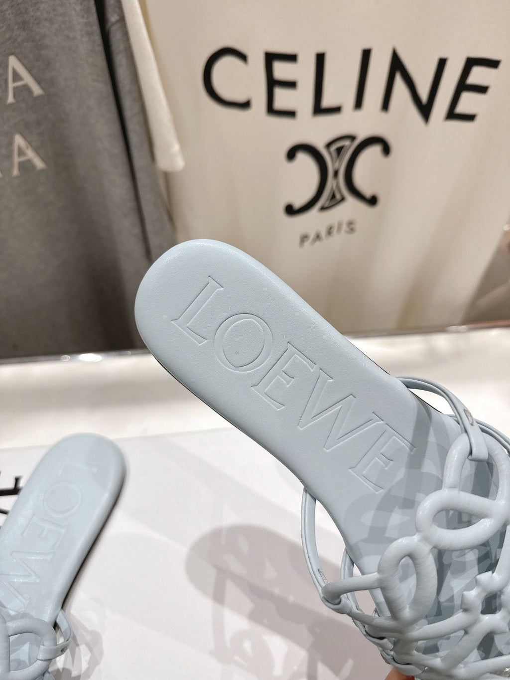 LOEWE 26S PETAL ANAGRAM SLIDE IN LIGHT BLUE CALFSKIN
