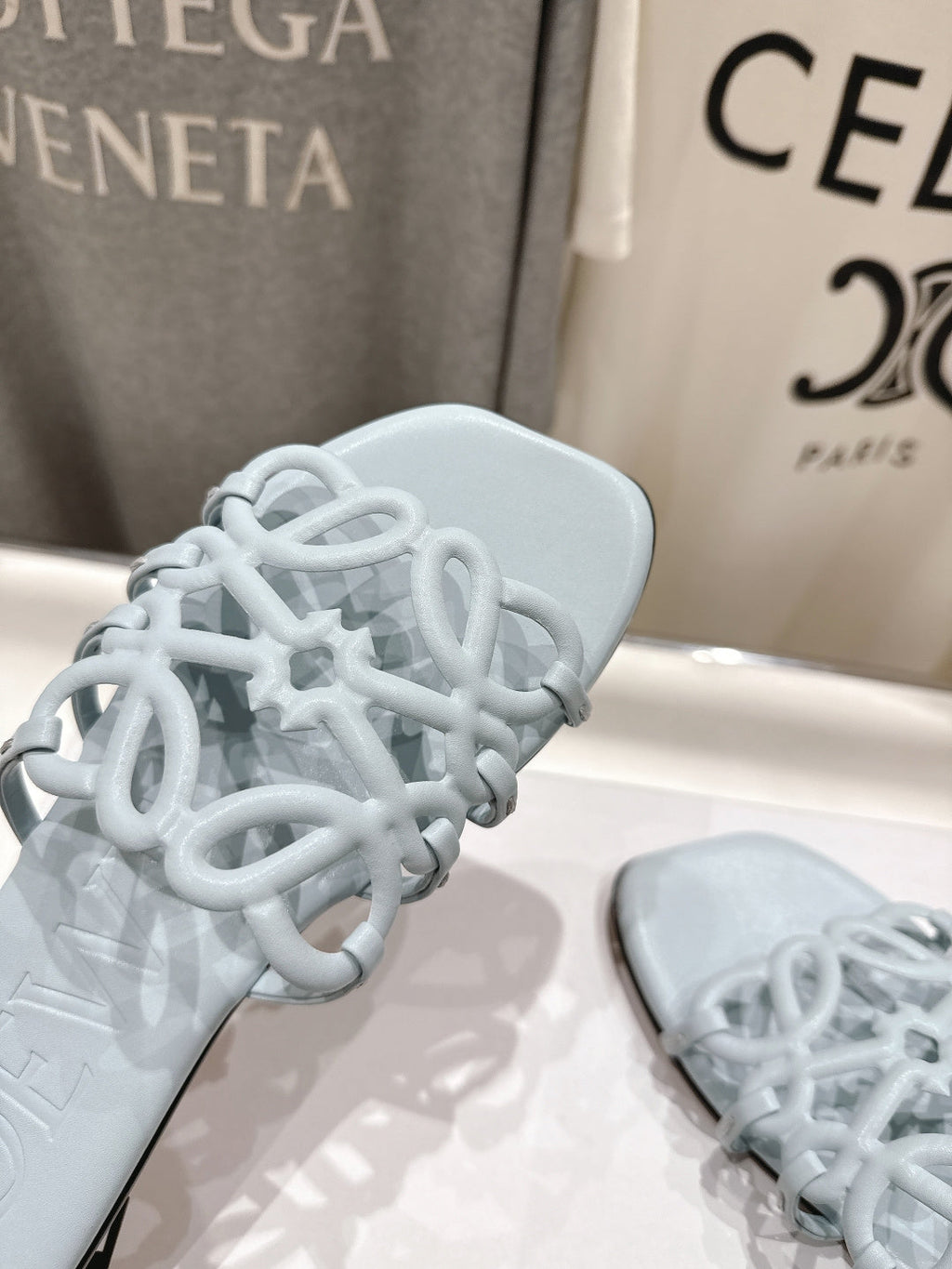LOEWE 26S PETAL ANAGRAM SLIDE IN LIGHT BLUE CALFSKIN