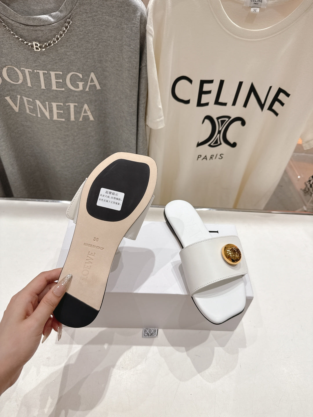 LOEWE 26S PEBBLE SLIDE IN WHITE CALFSKIN GOLD HARDWARE