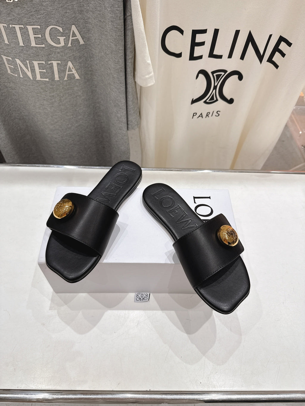 LOEWE 26S PEBBLE SLIDE IN BLACK CALFSKIN GOLD HARDWARE