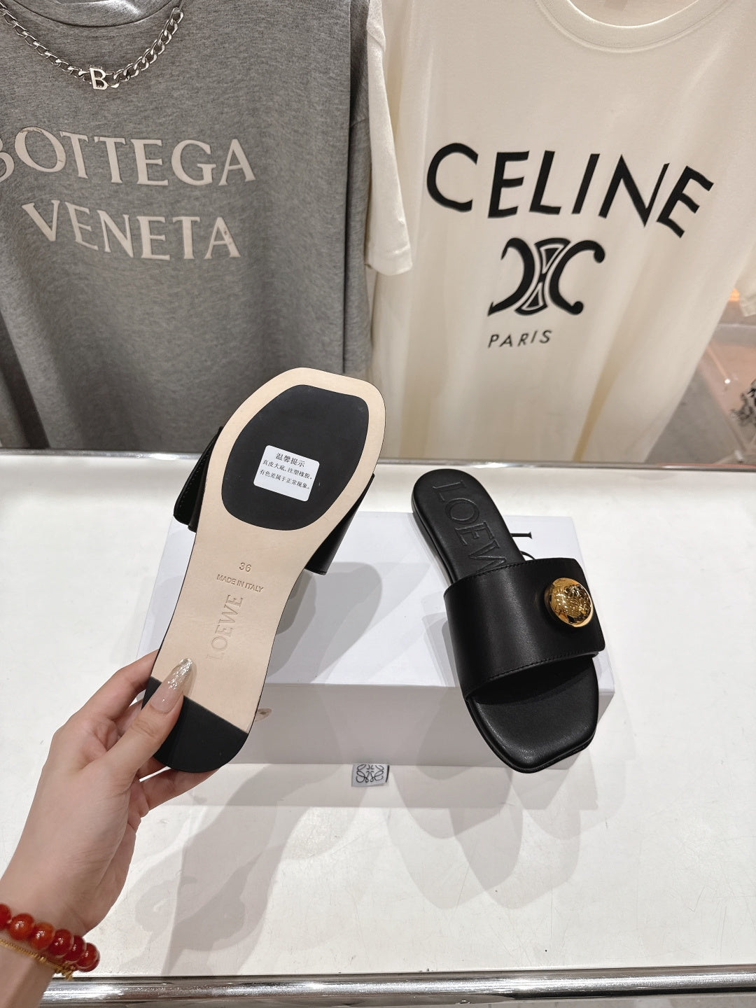 LOEWE 26S PEBBLE SLIDE IN BLACK CALFSKIN GOLD HARDWARE