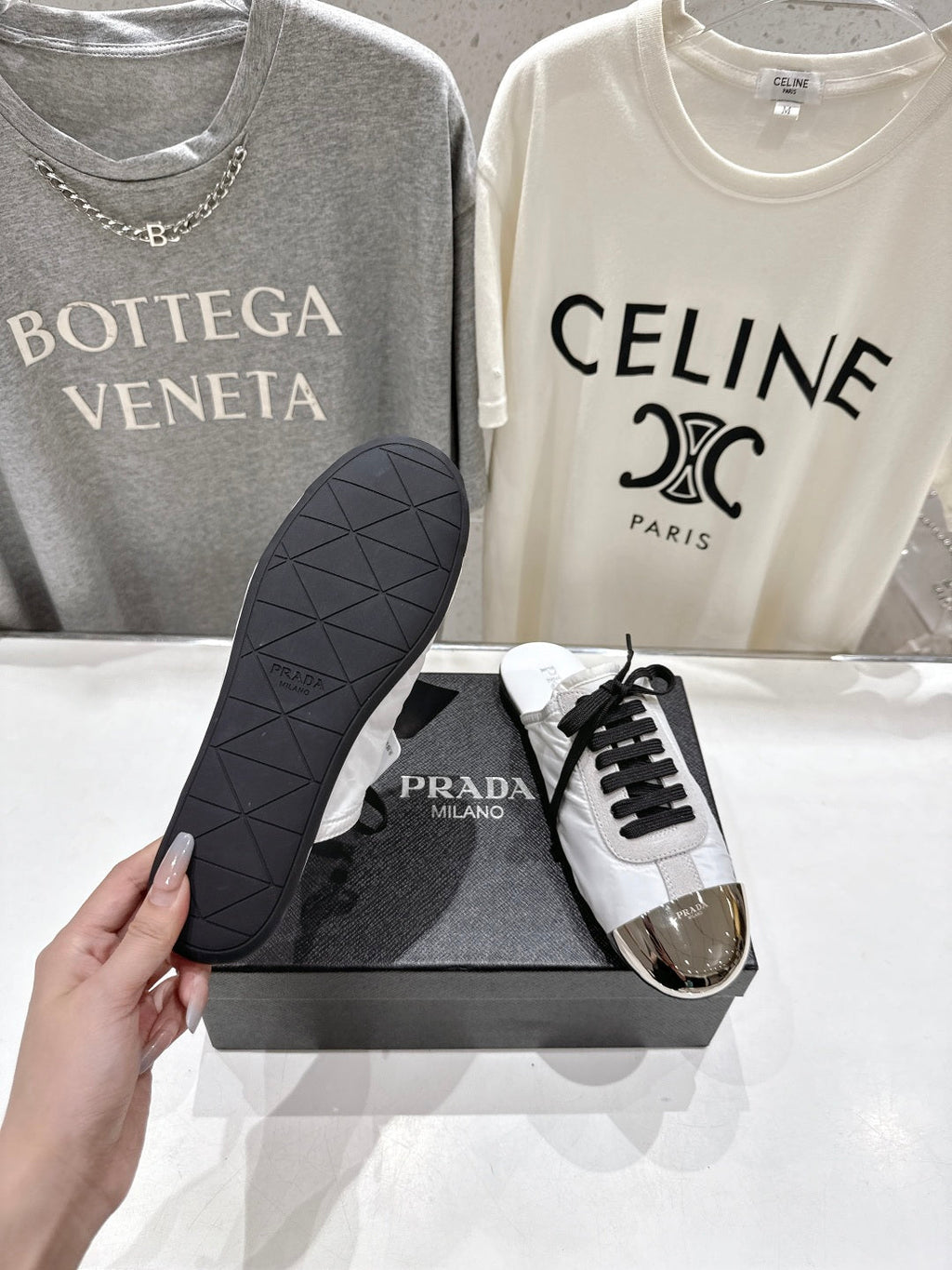 PRADA 25S MULES IN WHITE WITH METAL TOECAP