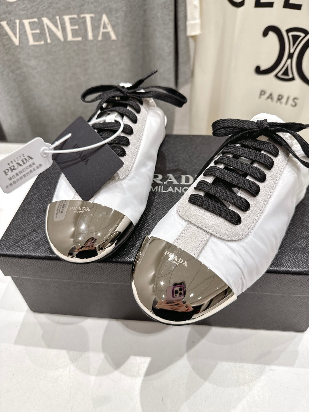 PRADA 25S MULES IN WHITE WITH METAL TOECAP