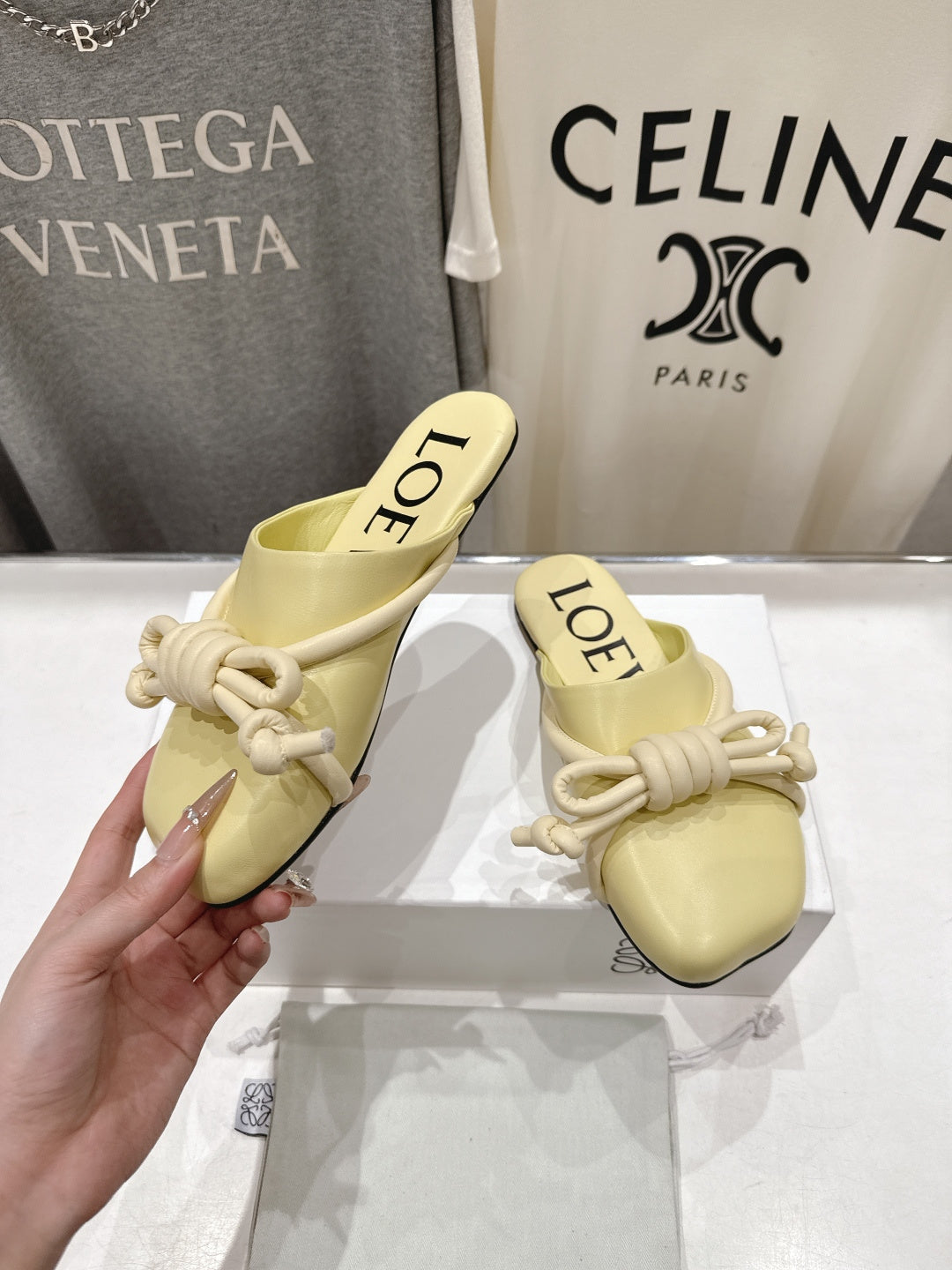 LOEWE 26S MULE LOAFERS IN BUTTER YELLOW CALFSKIN KNOT DETAIL