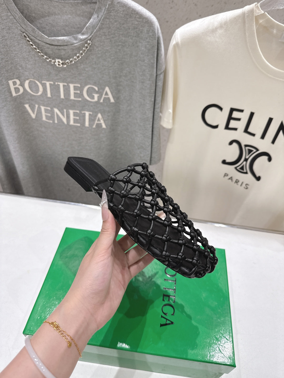 BOTTEGA VENETA 26S WOVEN MULES IN BLACK LAMBSKIN