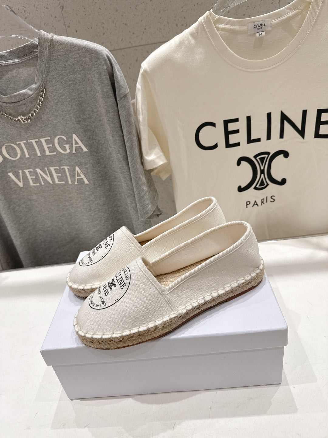 CELINE 26S MAISON PARIS EMBLEM ESPADRILLE FLATS IN IVORY WHITE CANVAS