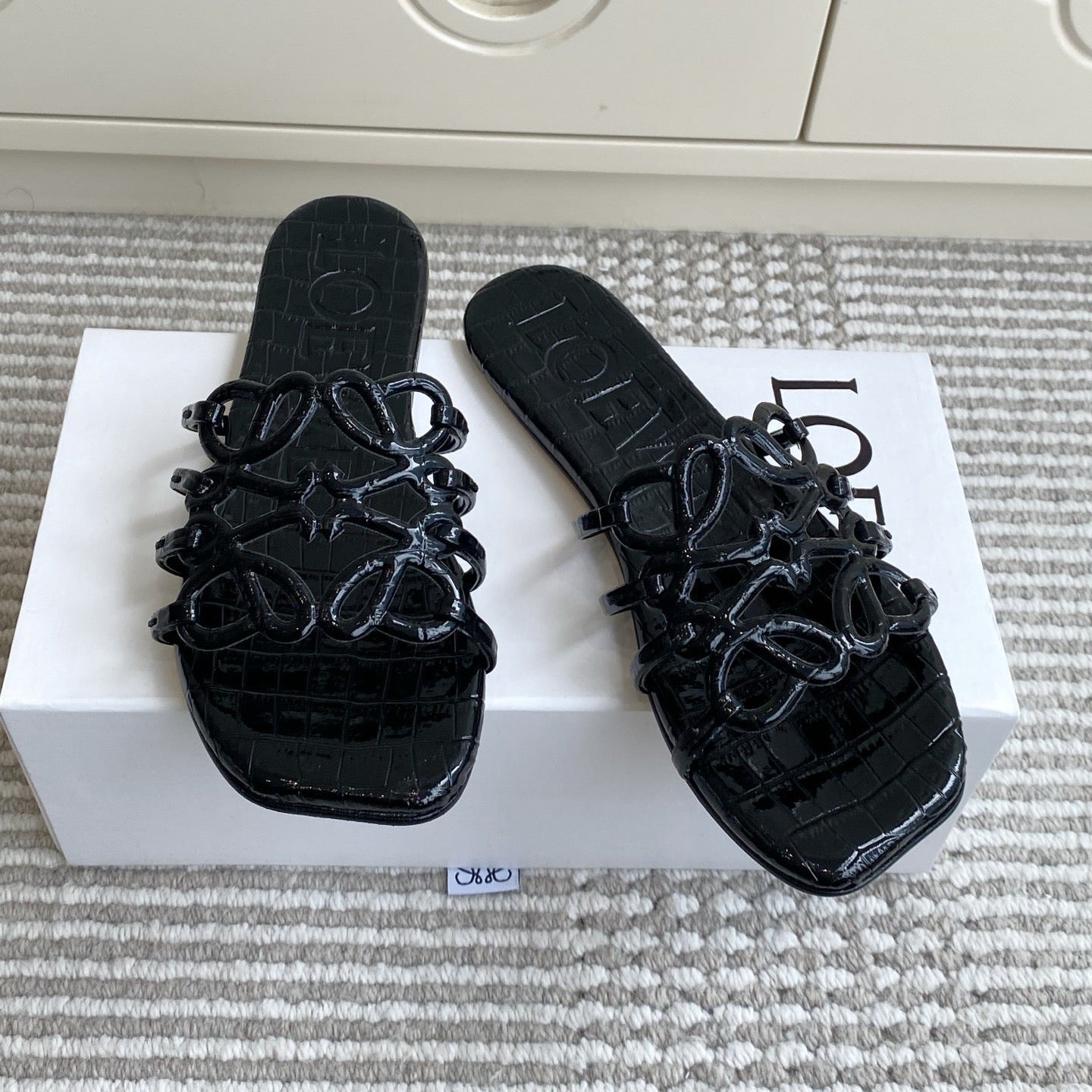 LOEWE 26S SLIDE SANDALS IN BLACK CROC-EMBOSSED PATENT CALFSKIN