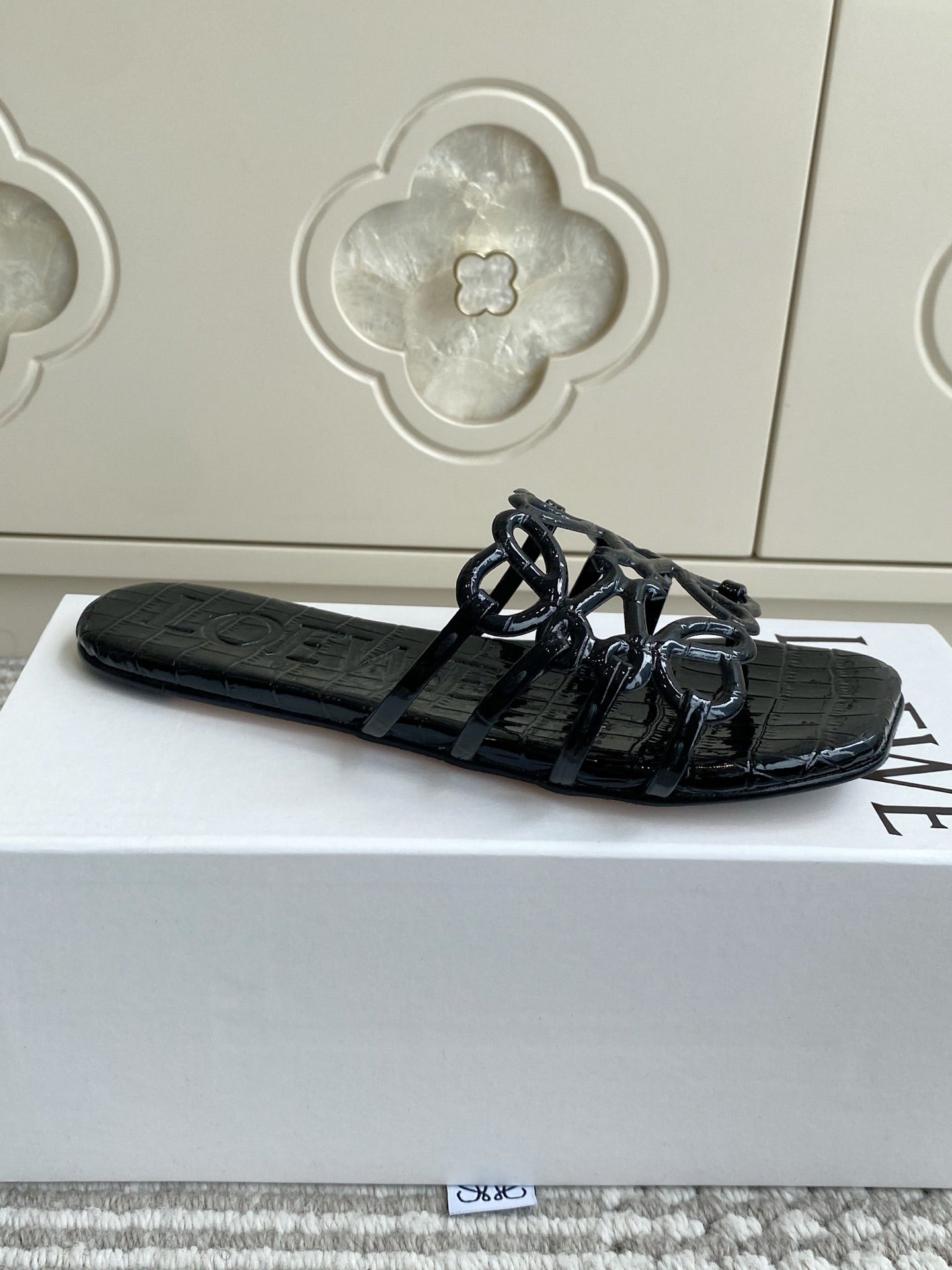 LOEWE 26S SLIDE SANDALS IN BLACK CROC-EMBOSSED PATENT CALFSKIN