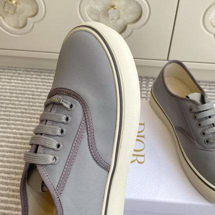 DIOR 26S LOW TOP SNEAKERS IN GREY CANVAS