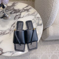 BOTTEGA VENETA 26S FLAT THONG SANDALS IN BLACK LAMBSKIN