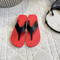 THE ROW 26S THONG SANDALS IN RED RUBBER WITH BLACK STRAPS CALFSKIN