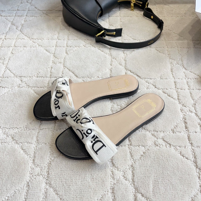 DIOR 26S DWAY SLIDE IN BLACK AND WHITE COTTON EMBOSSED LOGO