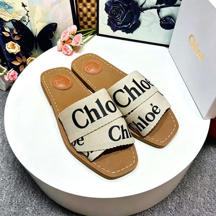 CHLOE 26S CRISSCROSS SLIDES IN BEIGE CANVAS