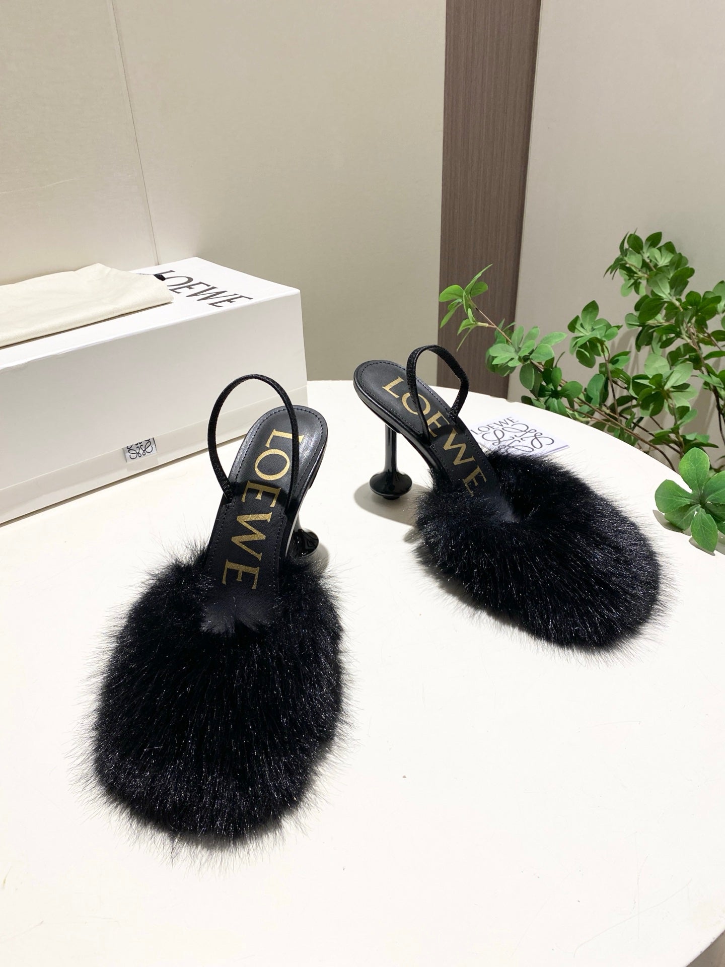 LOEWE 26S OPEN-BACK HIGH HEELS 100MM IN BLACK CALFSKIN WITH FUR