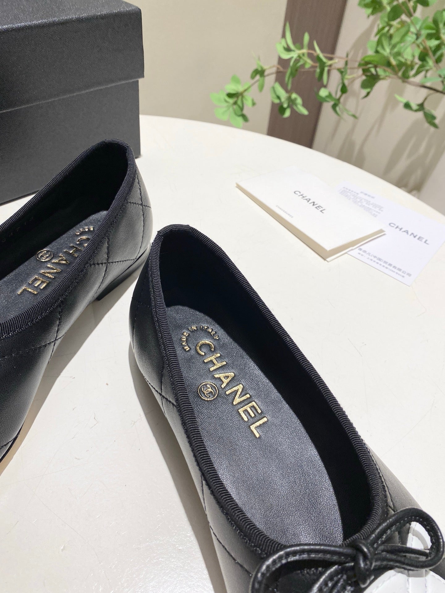 CHANEL 26S FLATS IN BLACK LAMBSKIN WITH BOW