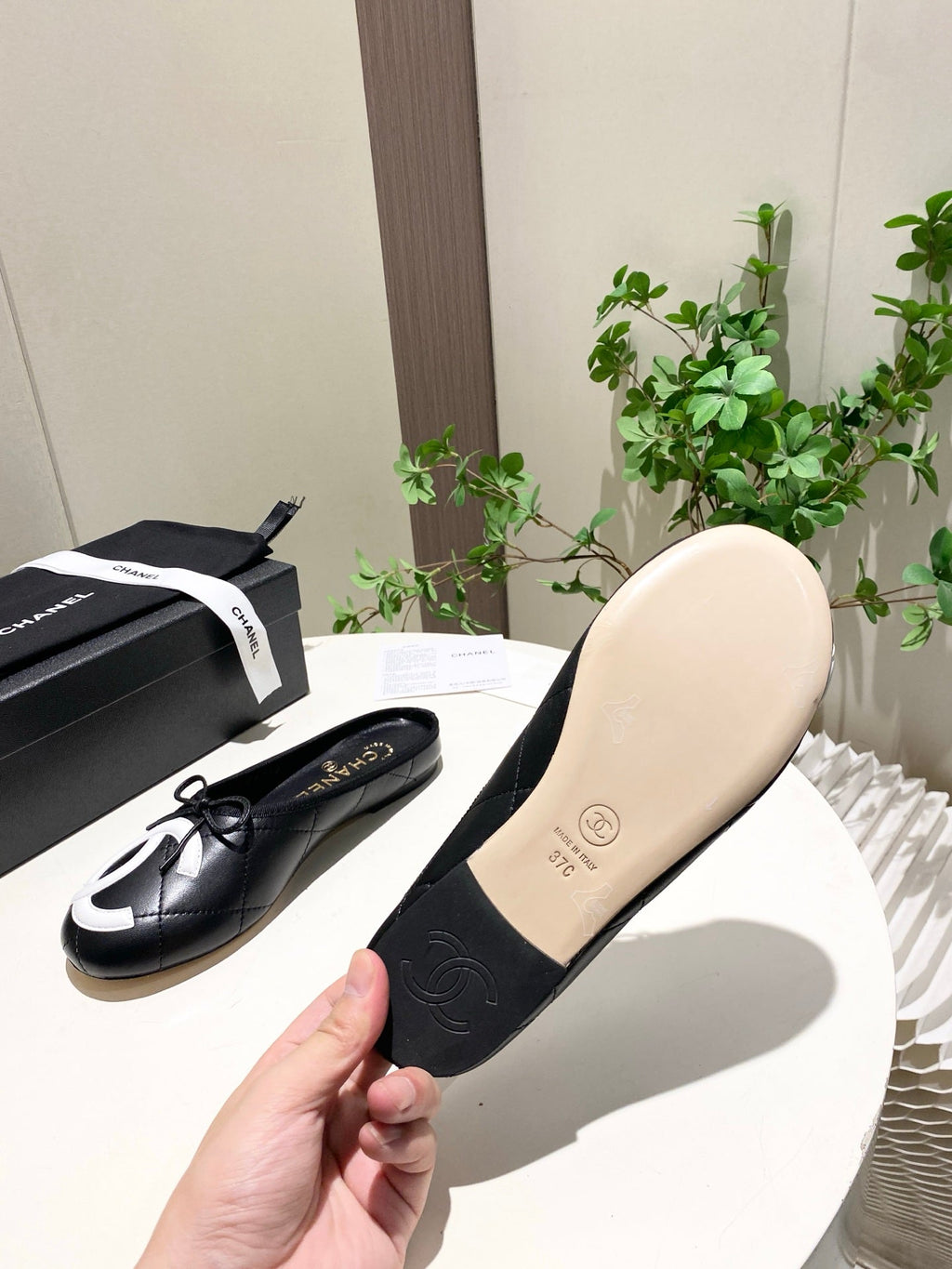 CHANEL 26S FLAT MULES IN BLACK LAMBSKIN