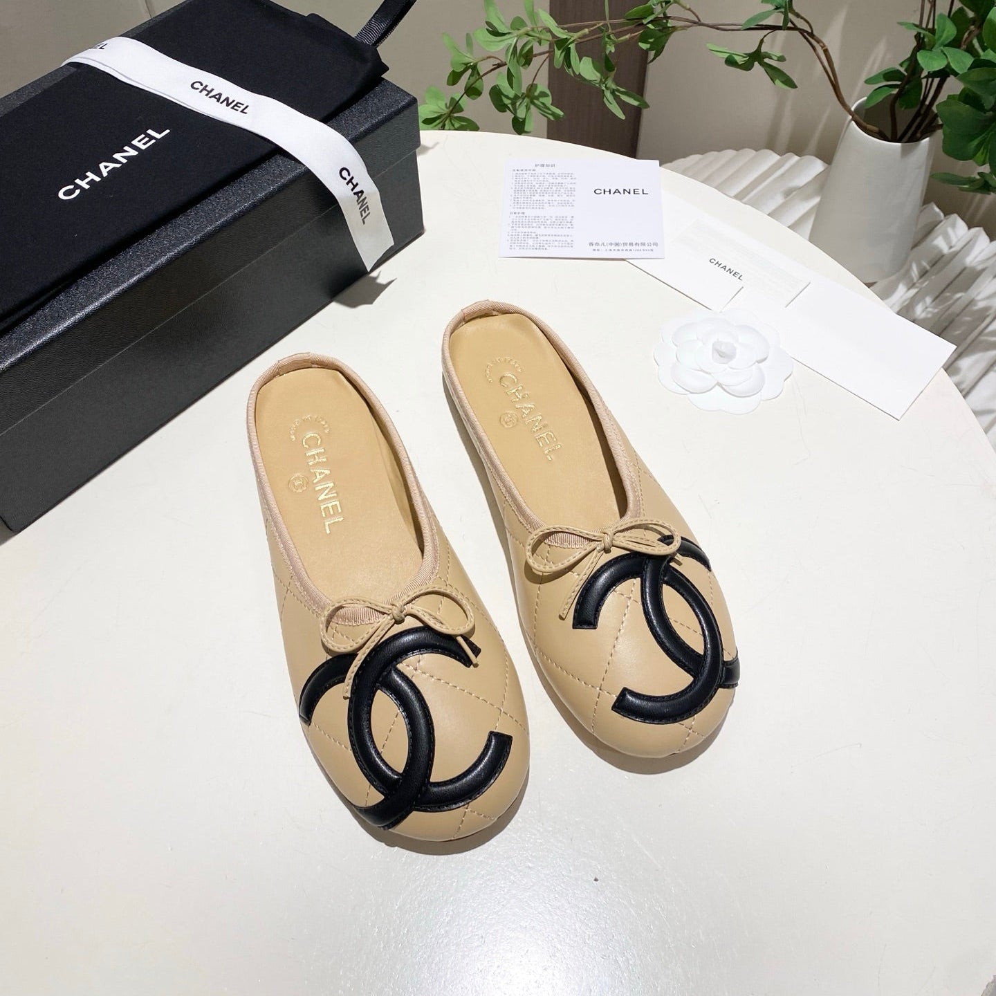 CHANEL 26S FLAT MULES IN BEIGE LAMBSKIN