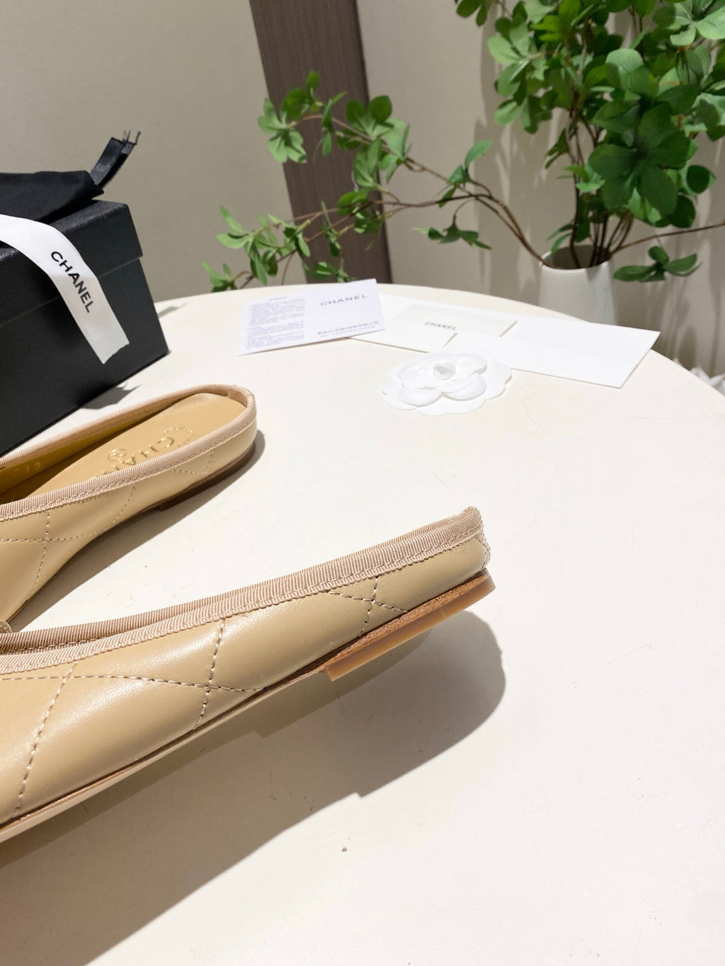 CHANEL 26S FLAT MULES IN BEIGE LAMBSKIN