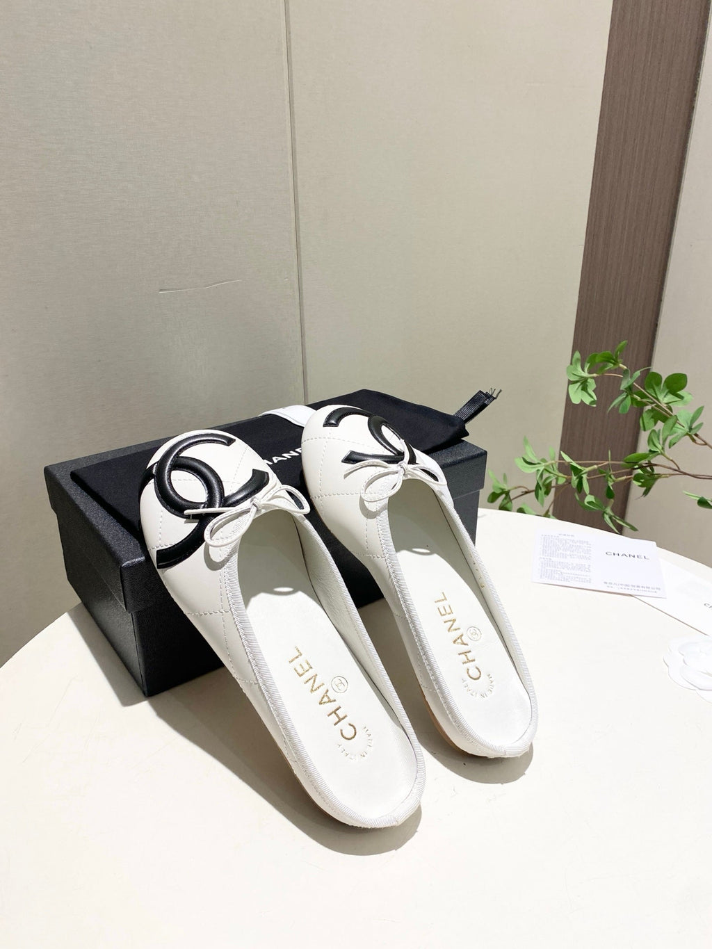 CHANEL 26S FLAT MULES IN WHITE LAMBSKIN