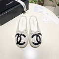 CHANEL 26S FLAT MULES IN WHITE LAMBSKIN