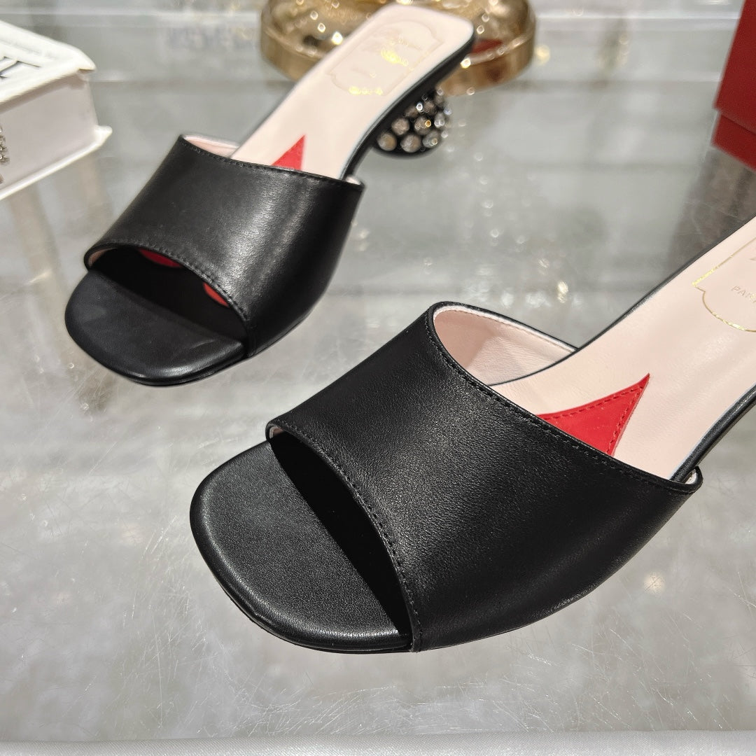 CRYSTAL HEEL MULE IN BLACK CALFSKIN