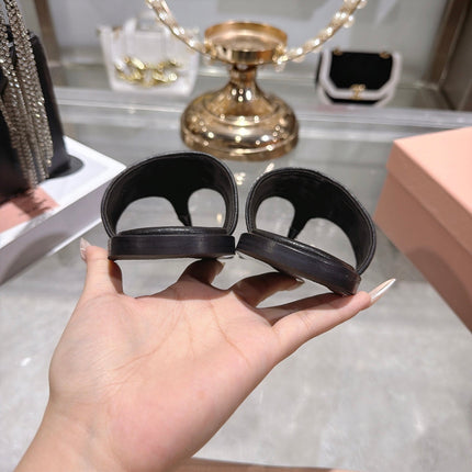 MIUMIU 26S THONG SANDALS IN BLACK RAFFIA CALFSKIN EMBOSSED LOGO
