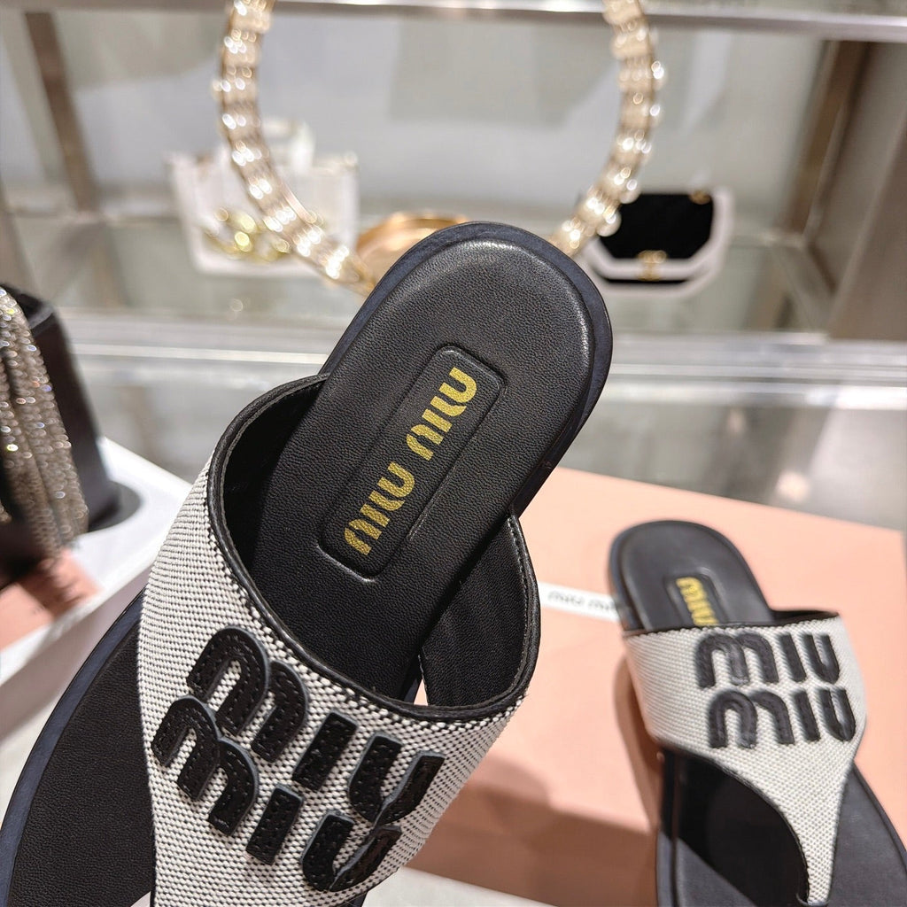 MIUMIU 26S THONG SANDALS IN WHITE CANVAS AND BLACK CALFSKIN LOGO