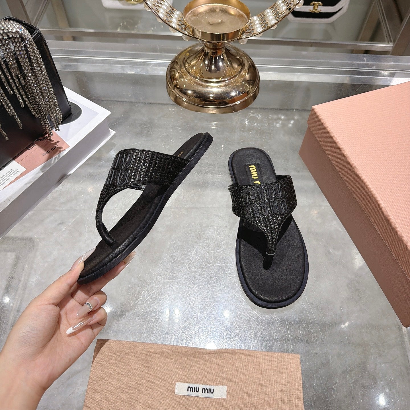 MIUMIU 26S THONG SANDALS IN BLACK RAFFIA CALFSKIN EMBOSSED LOGO